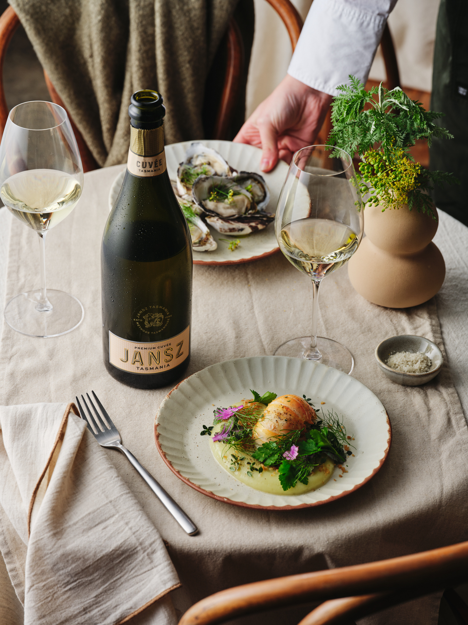 Jansz Tasmania Cuv&eacute;e with oysters on a set table